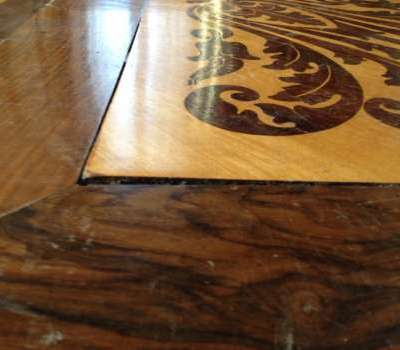 Restauro parquet antico a disegno con intarsio